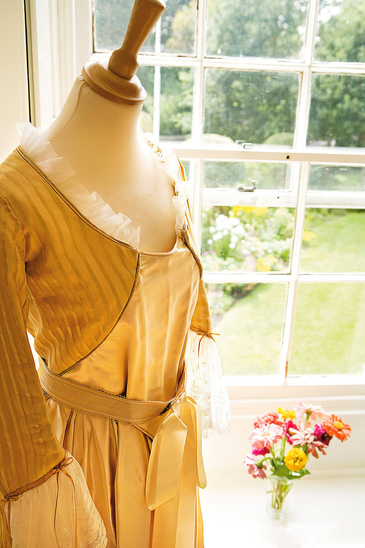 19th century style dress on mannequin