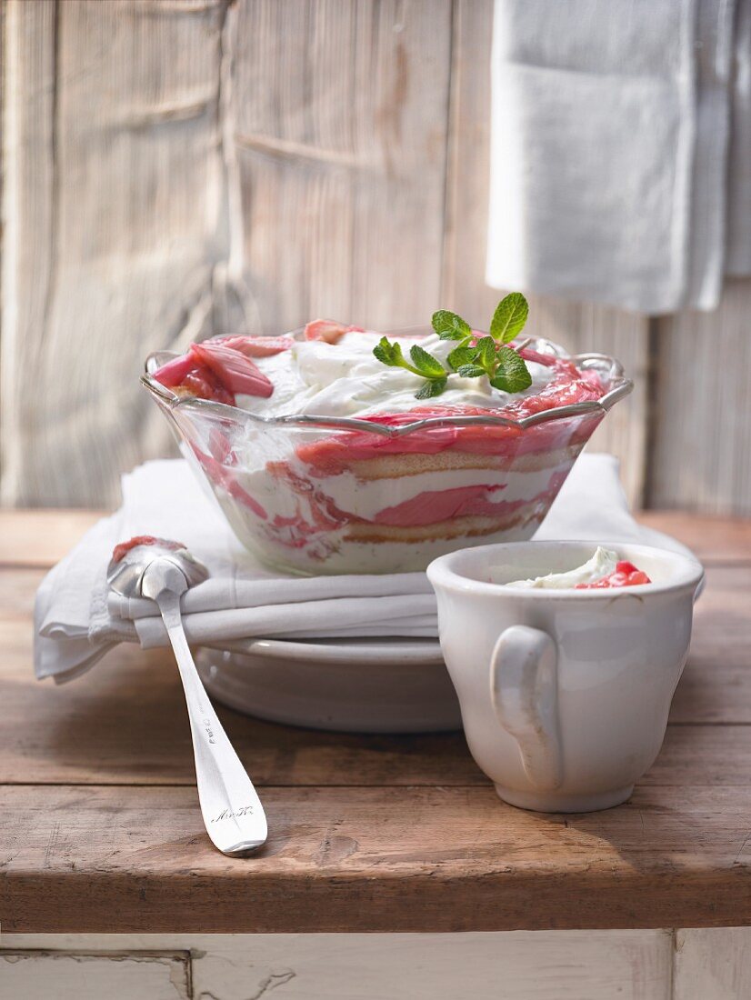 Rhubarb trifle with lemon balm, sponge and a lime and quark cream