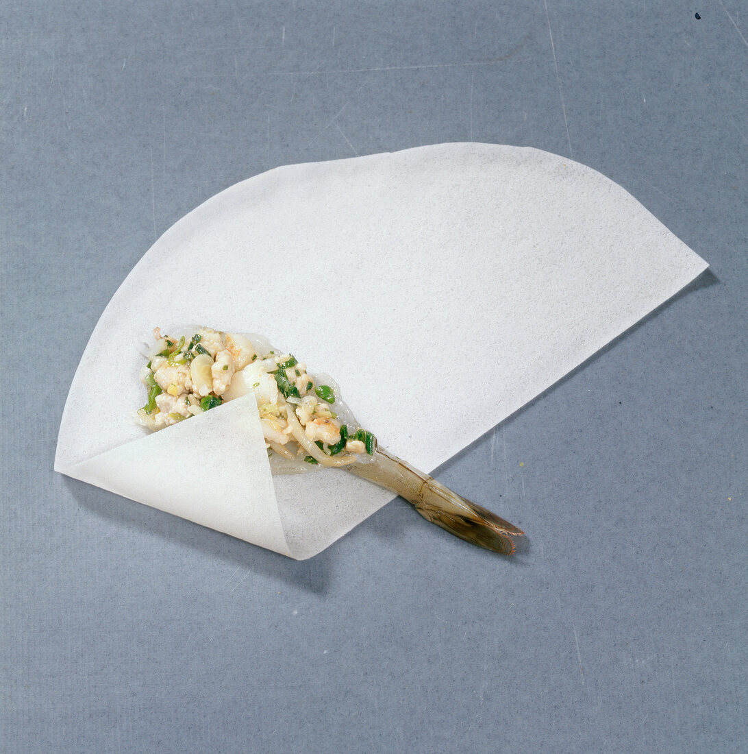 Shrimp with filling on dough sheet, step 1