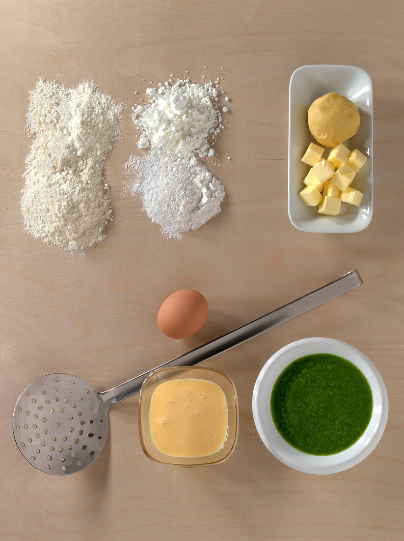 Different types of ingredients on beige background