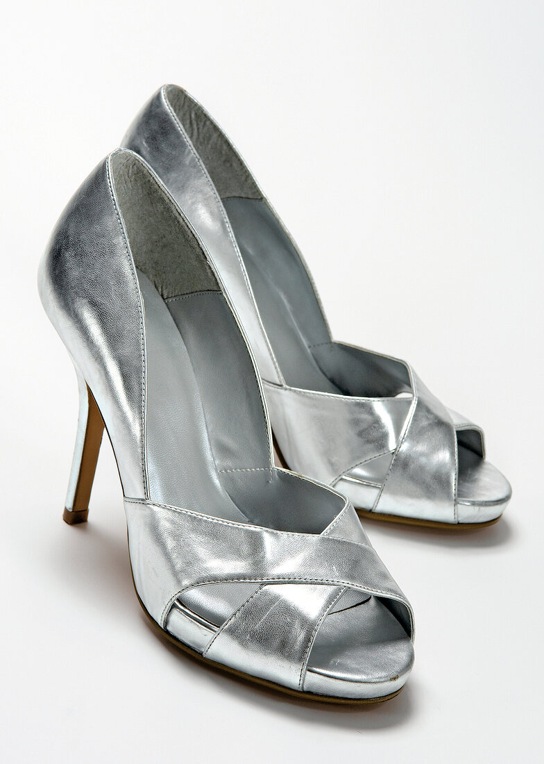 Sliver peep toes on white background