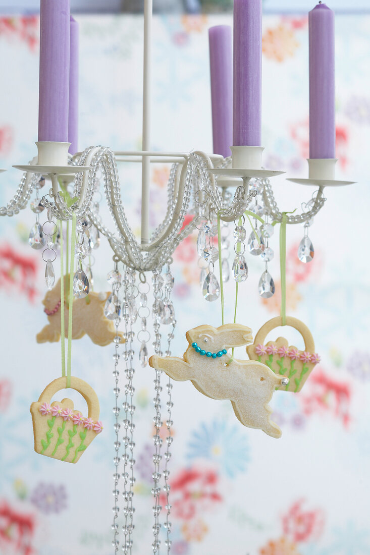 Easter decoration with baked bunnies and basket of chandeliers