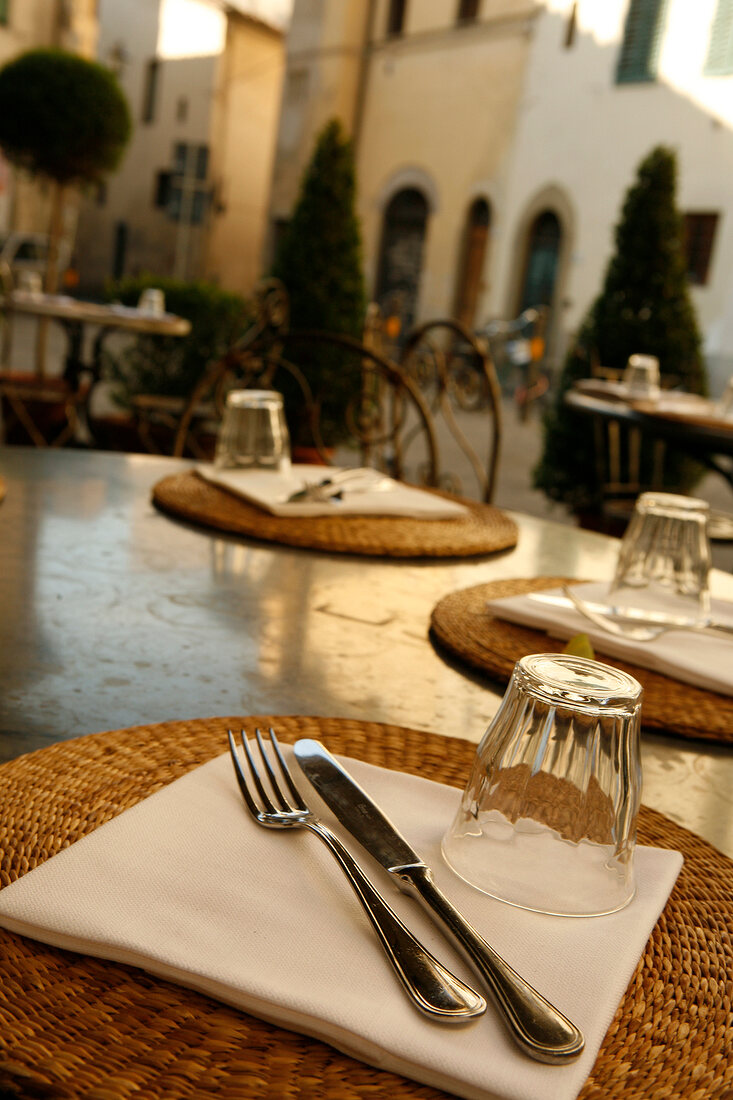 Close-up of table of restaurant in Italy