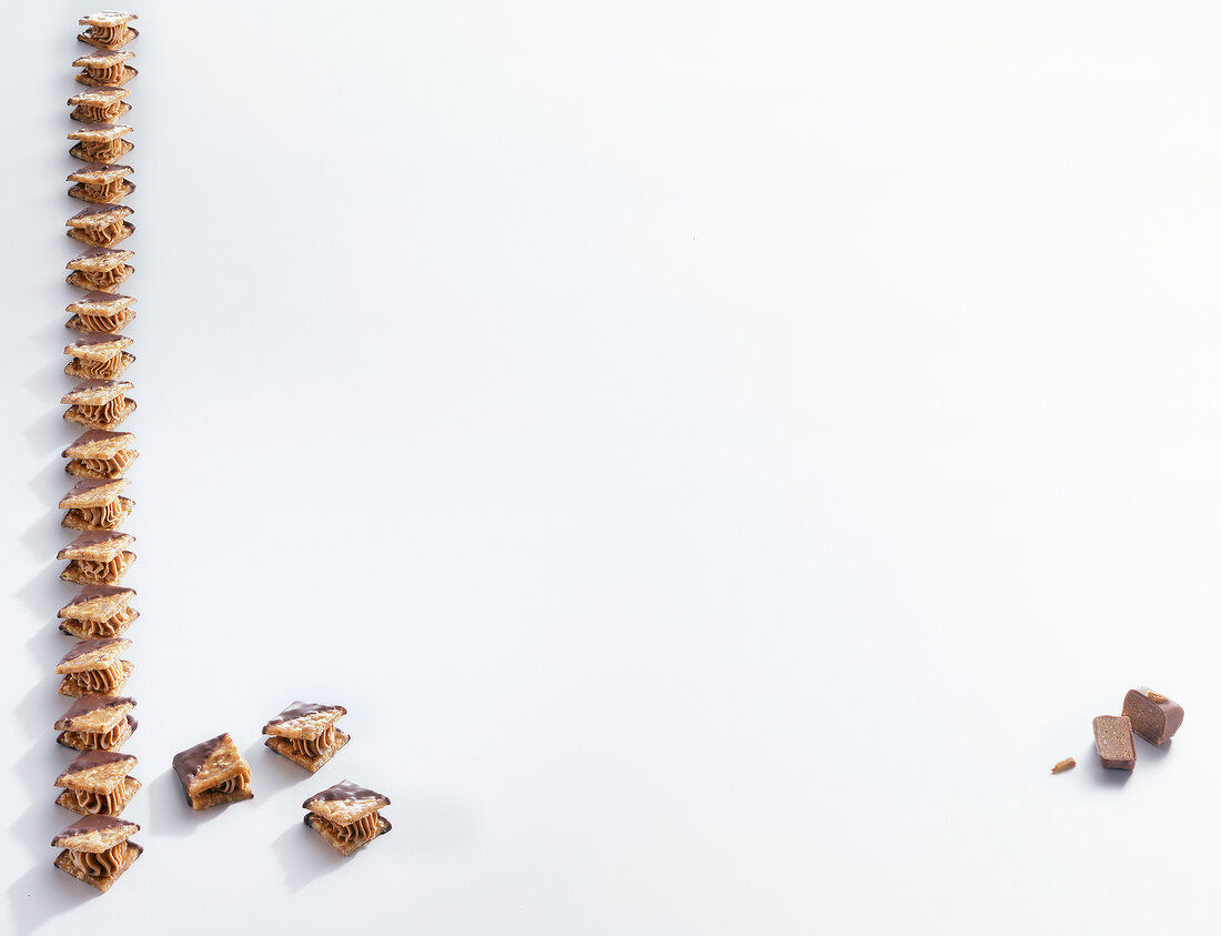 Almond nougat in a row on white background