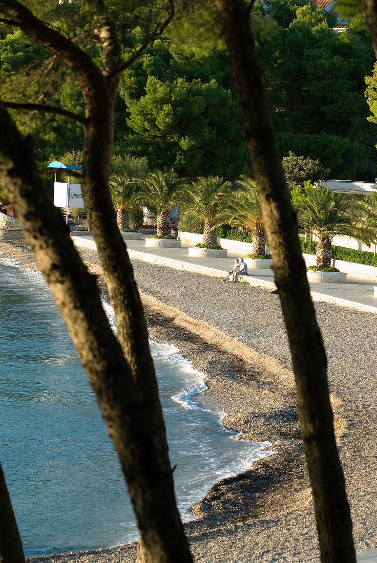 View of Le Meridien Lav with coastal beach and trees in Split, Croatia
