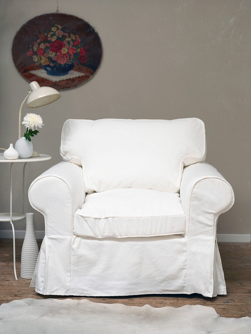 White armchair and retro bistro table