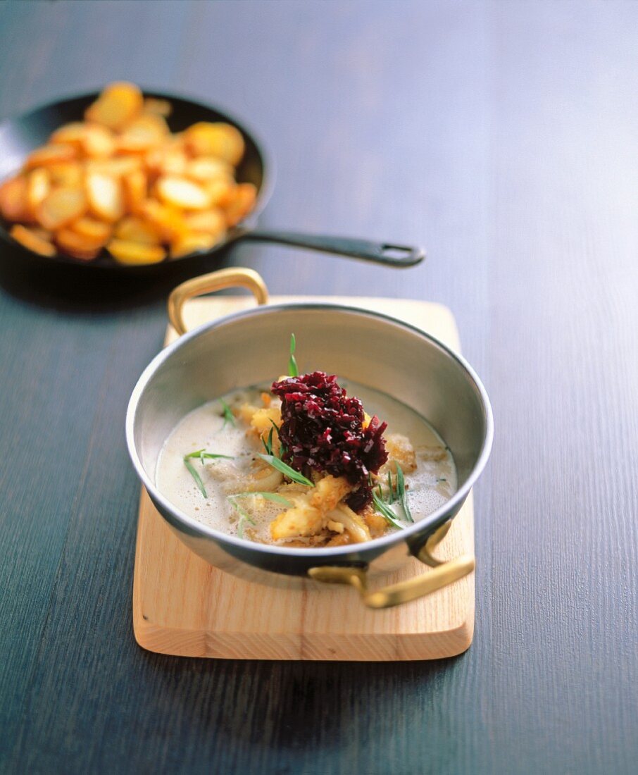 Veal tripe in verjus with a red shallot compote and fried potatoes