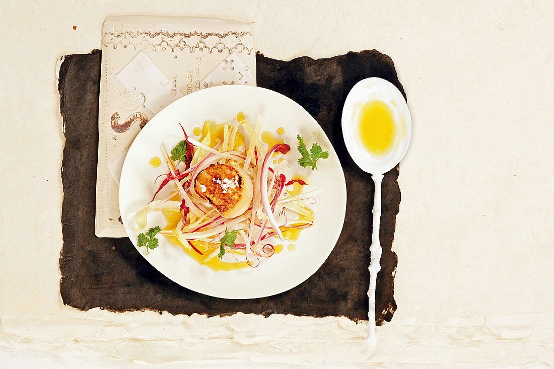 Chicory with fried scallops and an orange vinaigrette