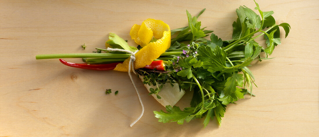 Bunch of vegetables and herbs for preparation of fish, overhead view