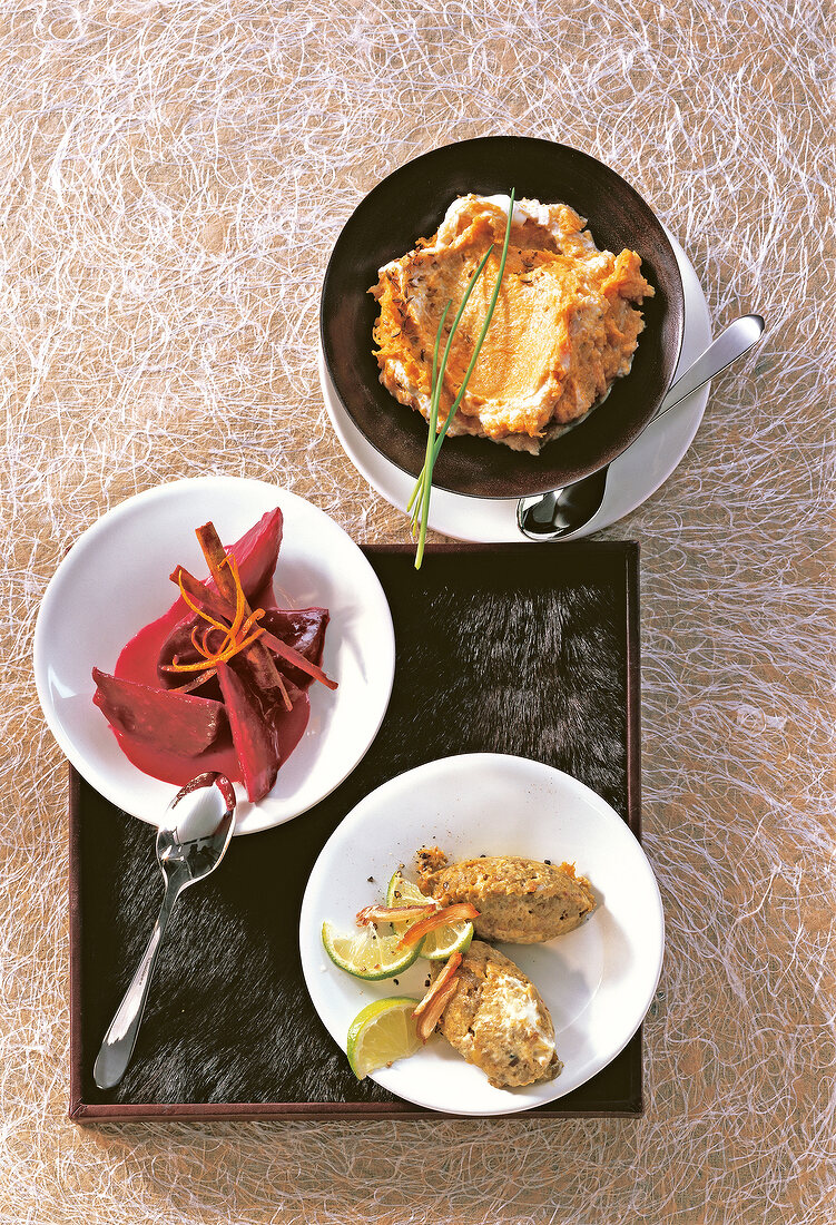 Pumpkin puree, beetroot and eggplant caviar in bowls