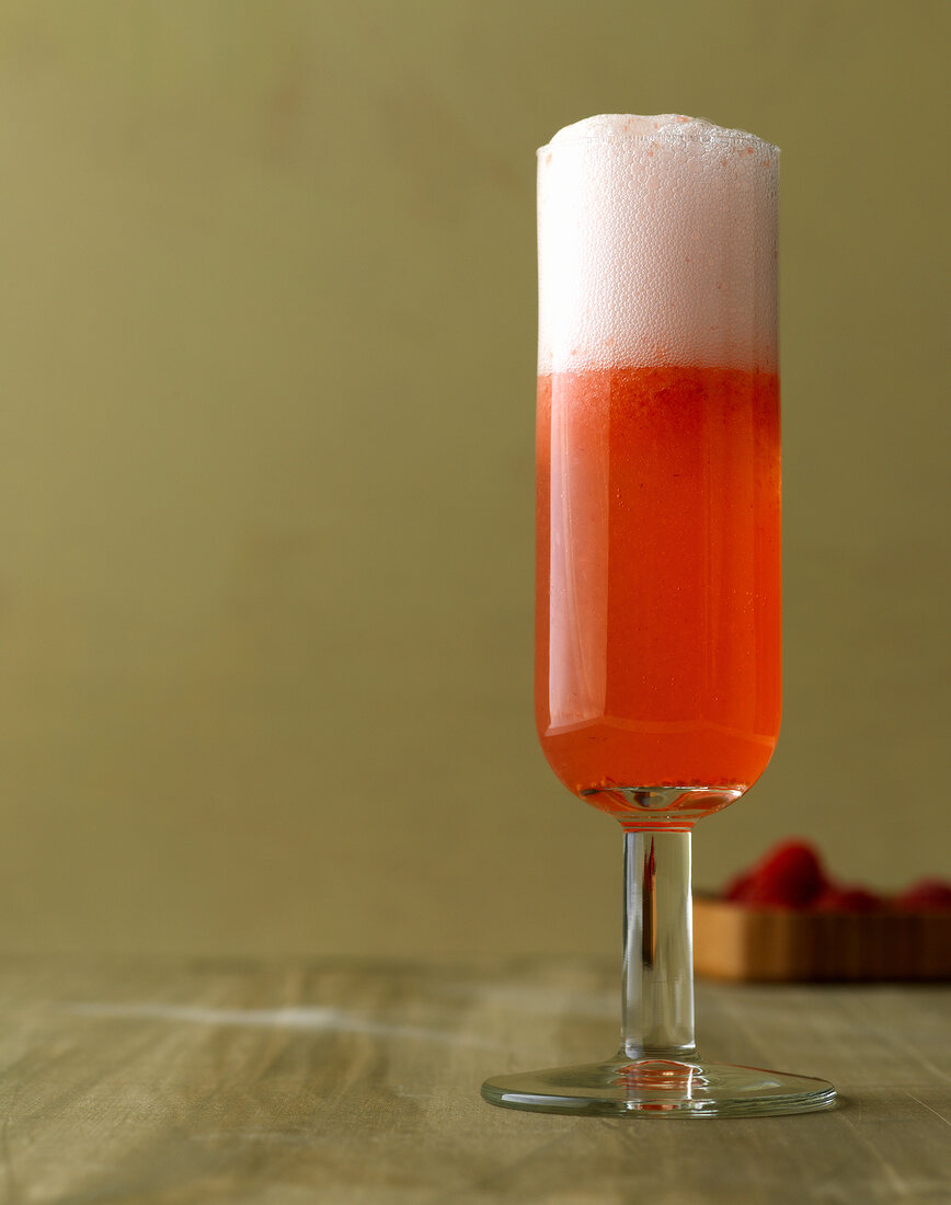 Melba Bellini prosecco with raspberries in champagne glass