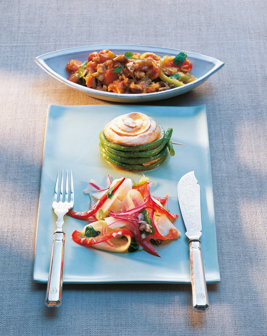 Conger Thai curry with papaya salad on plate