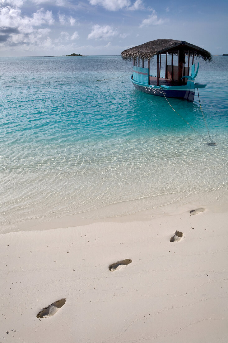Traditional boat Dhoni in sea in Dhigufinolhu island, Maldives