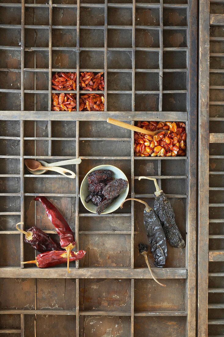 Different types of dried chillies, overhead view