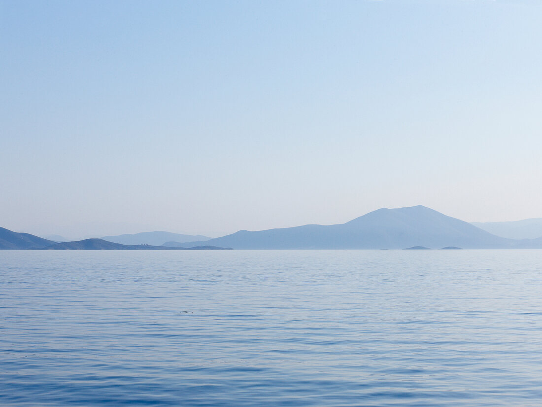 View of sea with Pelion mountain in background, Eastern Magnesia, Greece