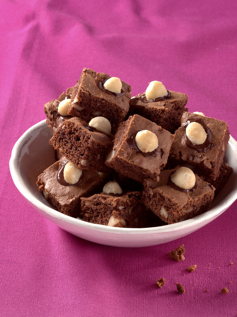 Brownies with macadamia nuts in bowl
