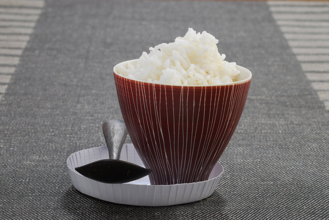 Close-up of white rice in cup