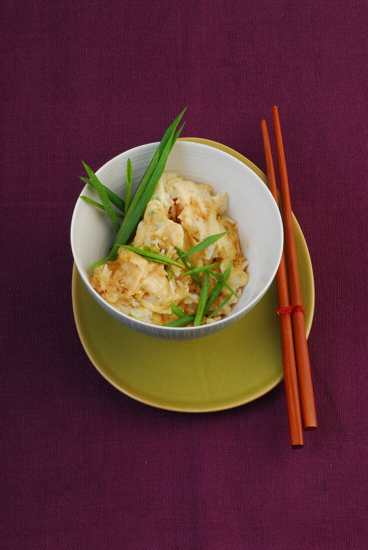 Spring onion rice with egg in bowl