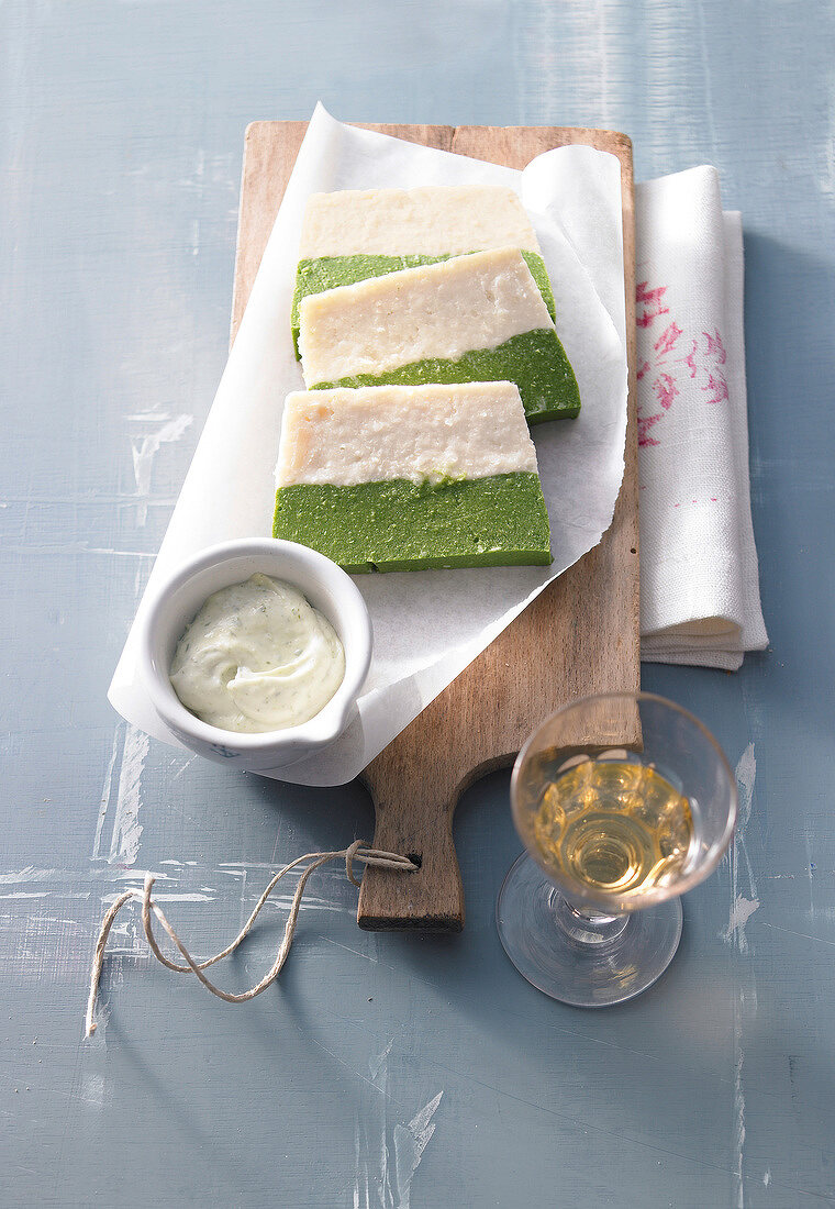 Celery and spinach vegetable terrine on small board