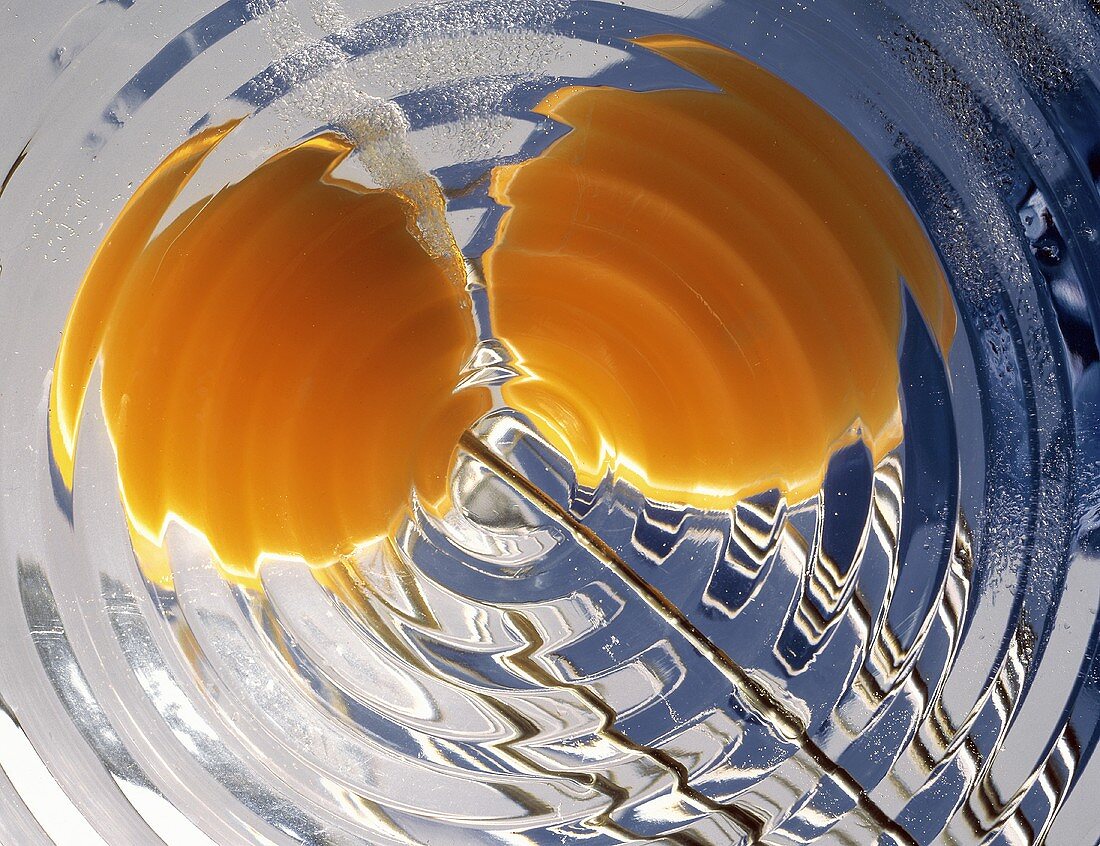 Two Egg Yolks in Glass Bowl