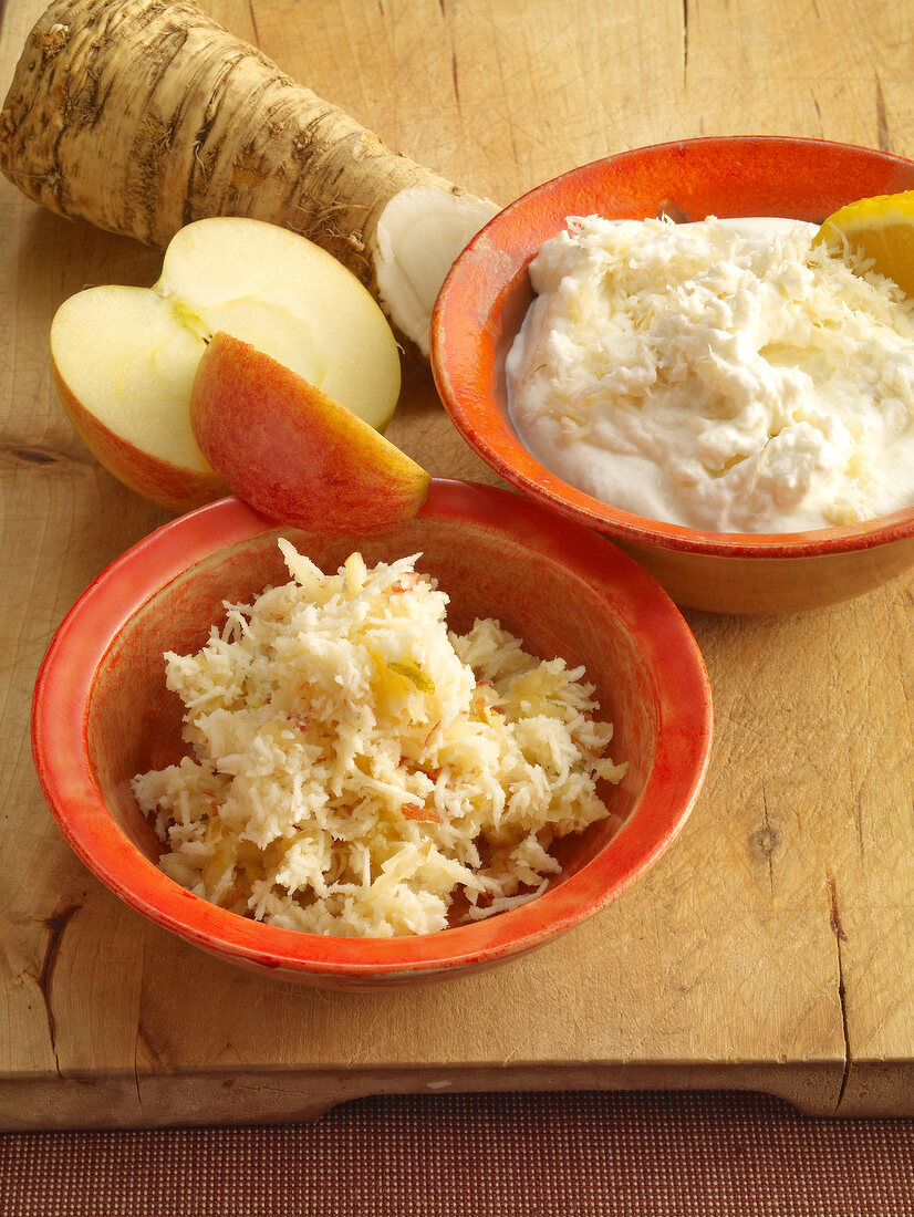 Horseradish cream mixed with apple and lemon in bowl