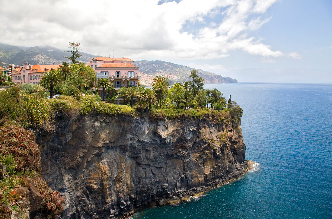 View of Hotel Reid's Palace at Atlantic rocky coast in Funchal, Madeira, Portugal