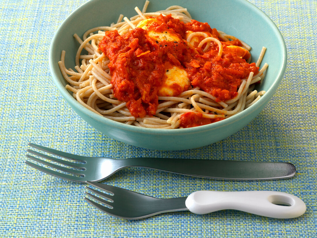 Pasta with ajvar carrot sugo in bowl