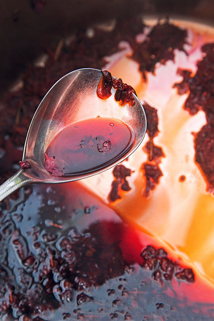 Close-up of natural red colour on spoon