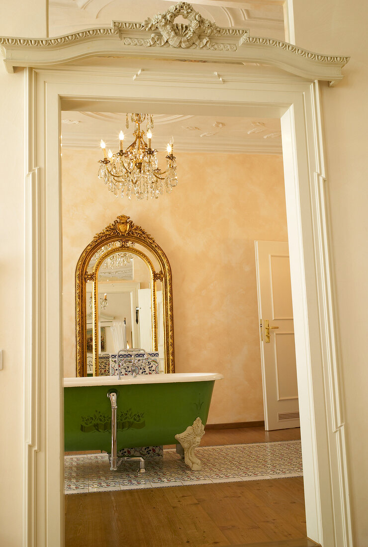 Gilded mirror in bathroom of Hotel Orphee at Regensburg, Bavaria, Germany