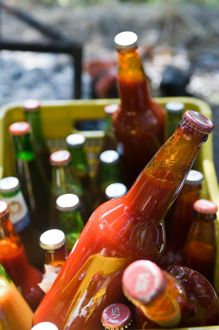 Close-up of tomato puree in bottles