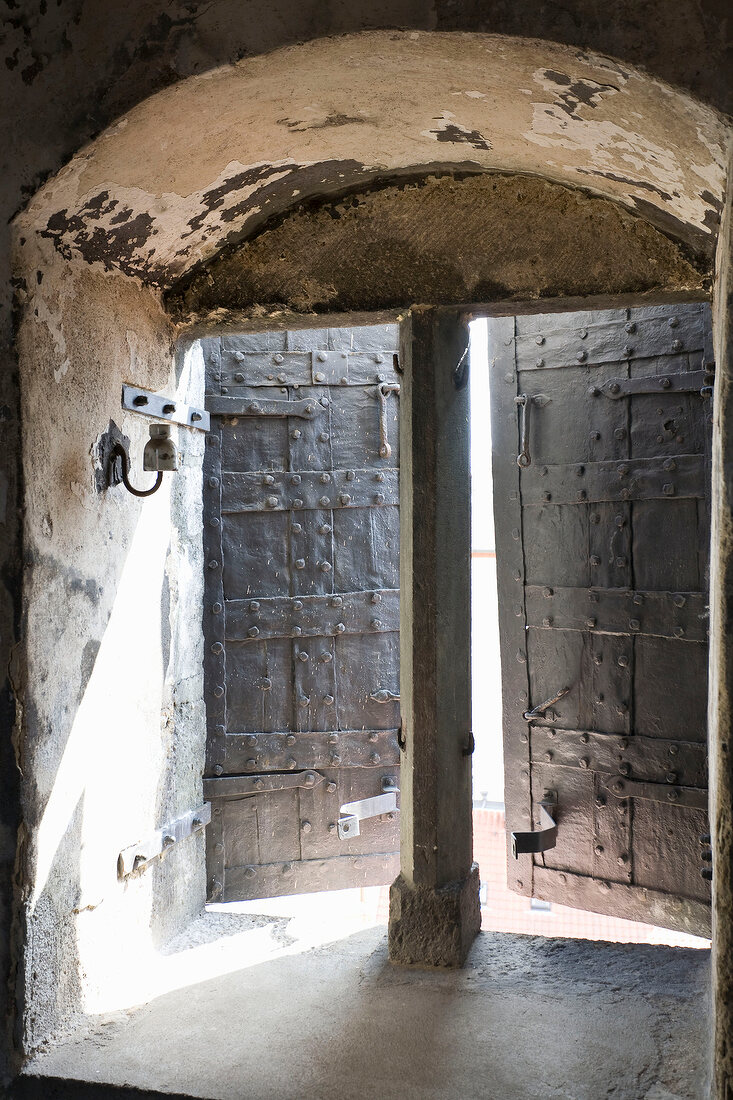 View of houses through window of Baumburger Tower in Regensburg, Germany