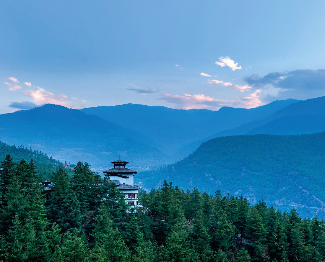 View of Uma Paro Hotel overlooking Himalayan mountain range, Bhutan