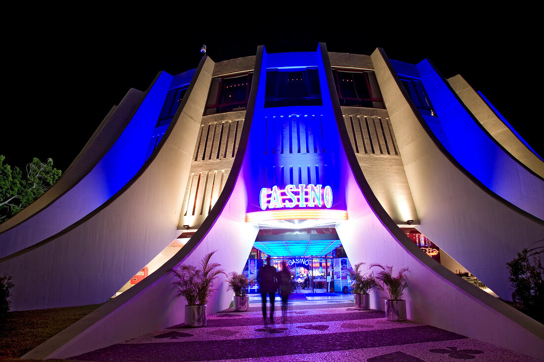 View of illuminated Belauchtet Casino entrance at night in Madeira, Portugal