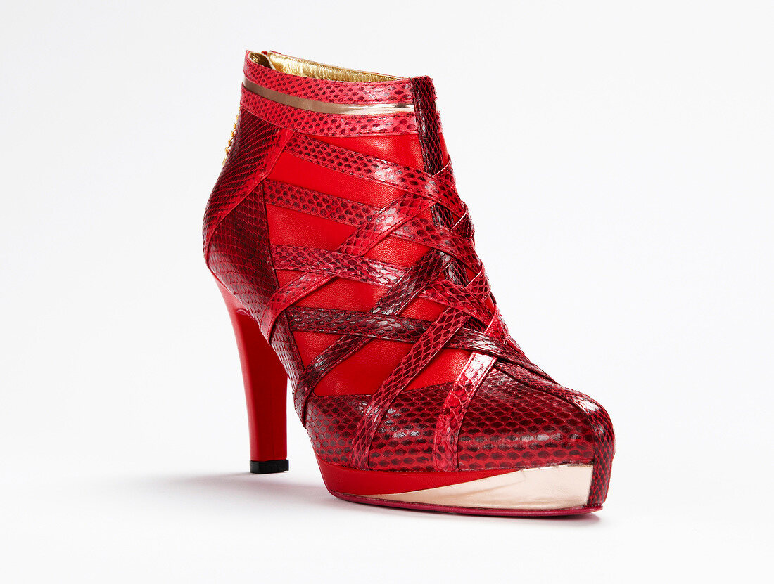 Ankle boot with smooth leather and imitation snakeskin with straps