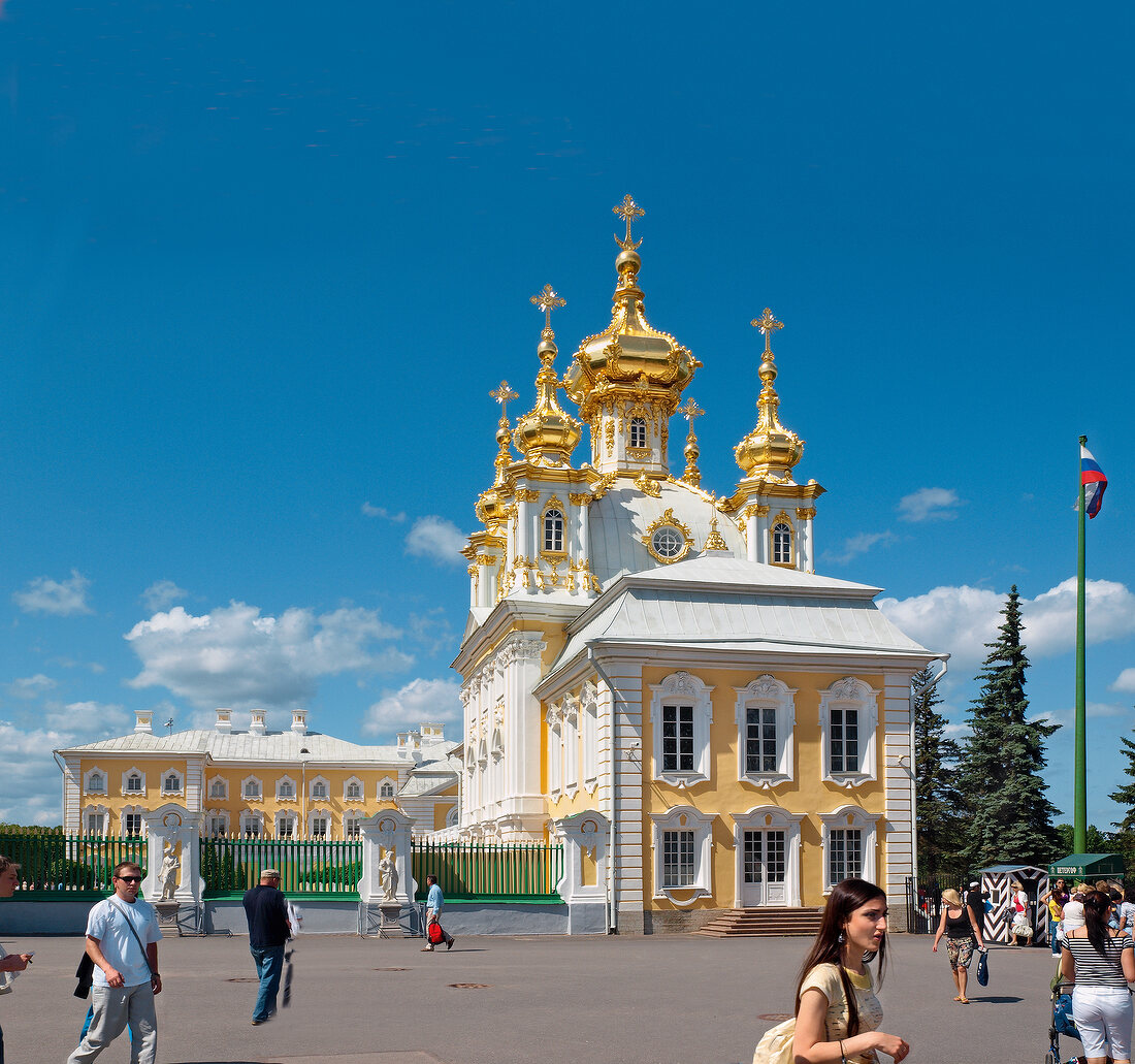 People at The chapel of Peterhof Palace with golden domes in Saint Petersburg, Russia