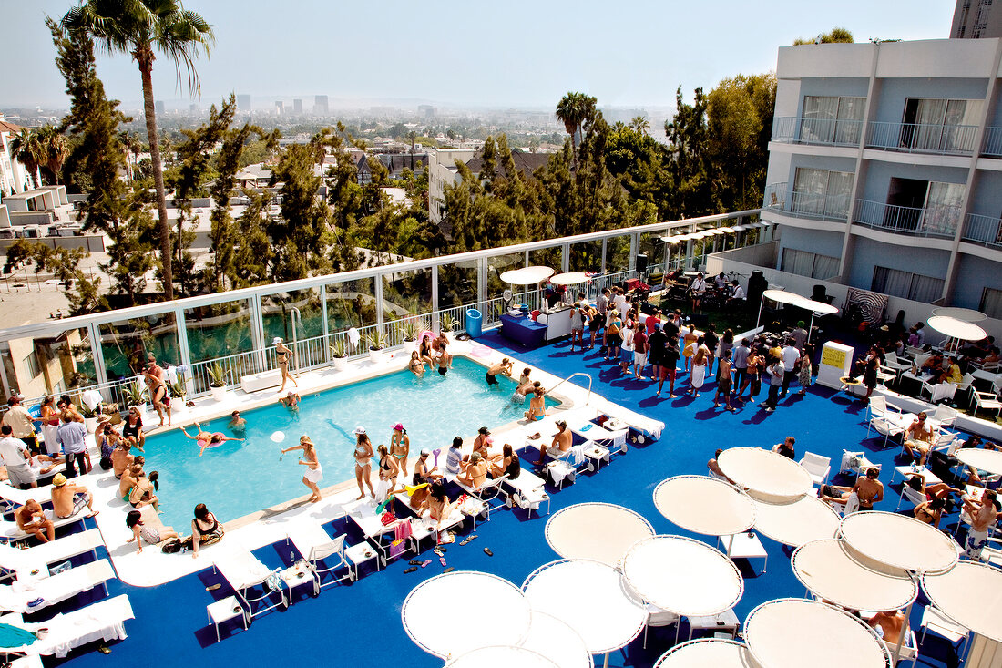 Elevated view of people enjoying at pool in Hotel The Standard's, Los Angeles, USA