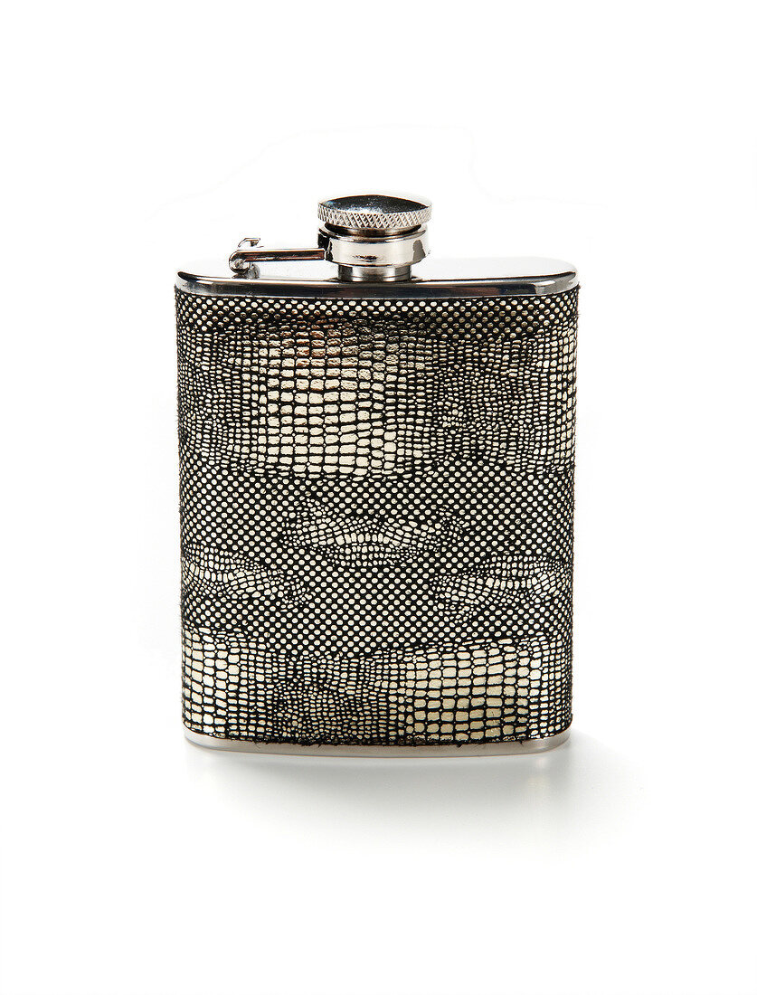 Close-up of hip flask with screw cap on white background