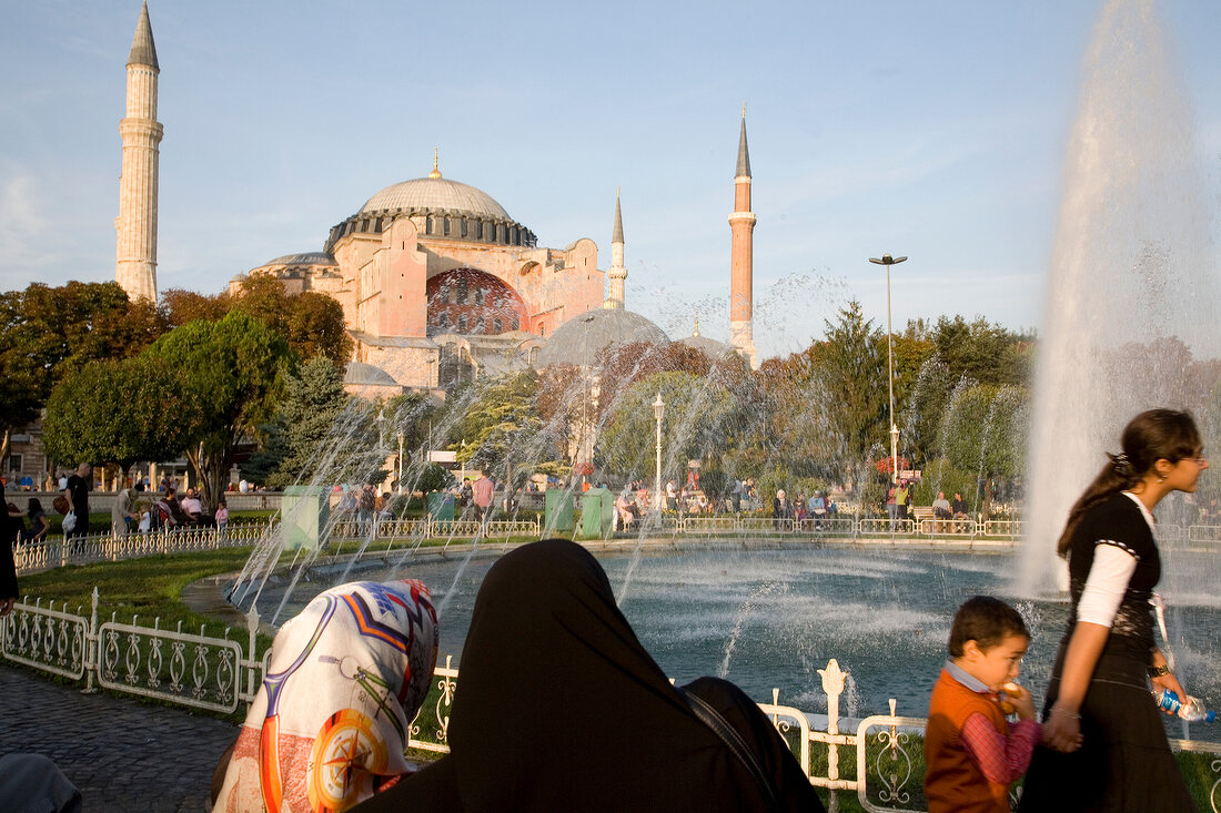 View of Hagia Sophia mosque with fountain and people in Istanbul, Turkey
