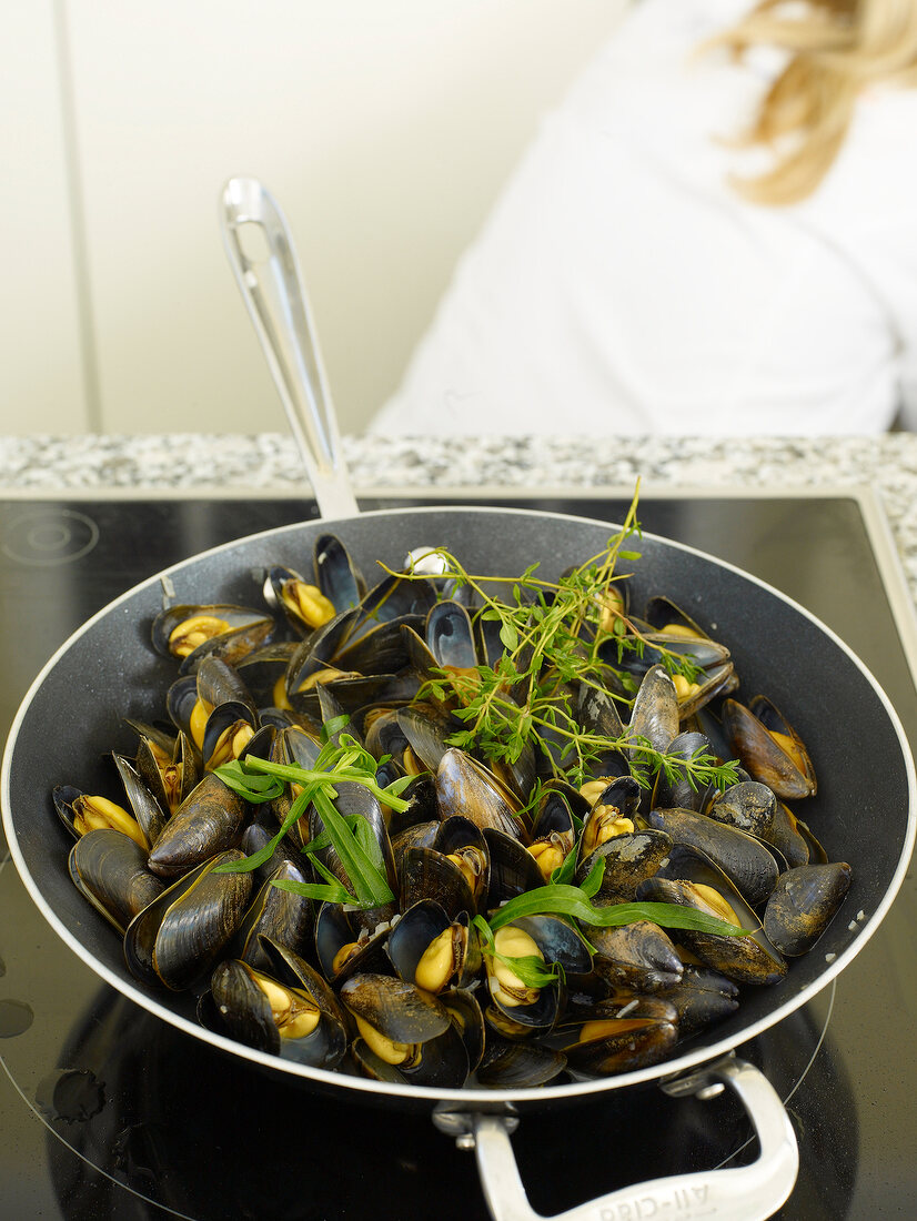 Close-up of mussels in pan