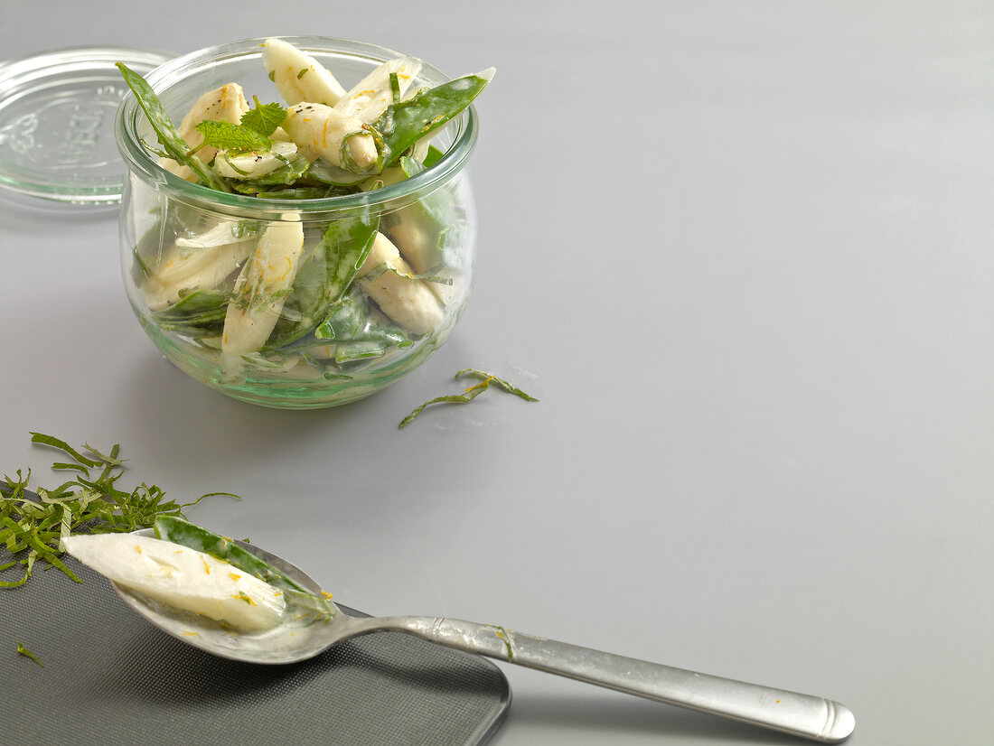 Sugar snap peas and asparagus salad in glass jar