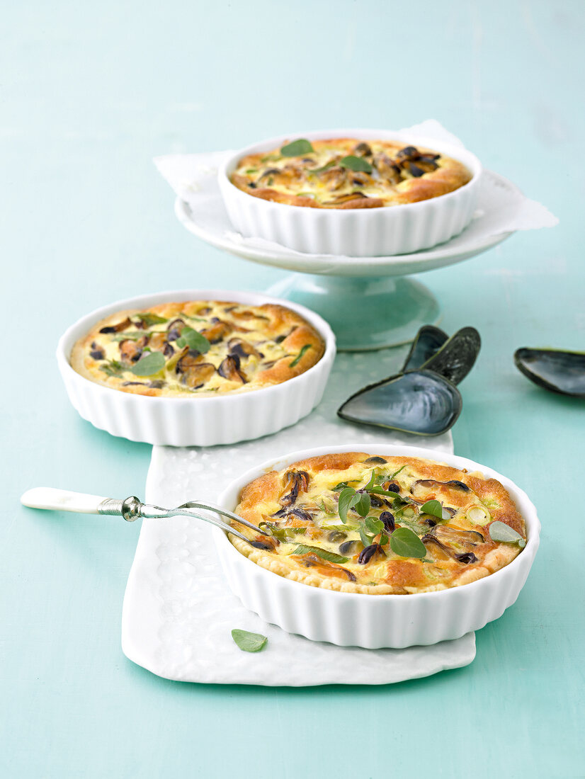 Leek tart with mussels in serving dish