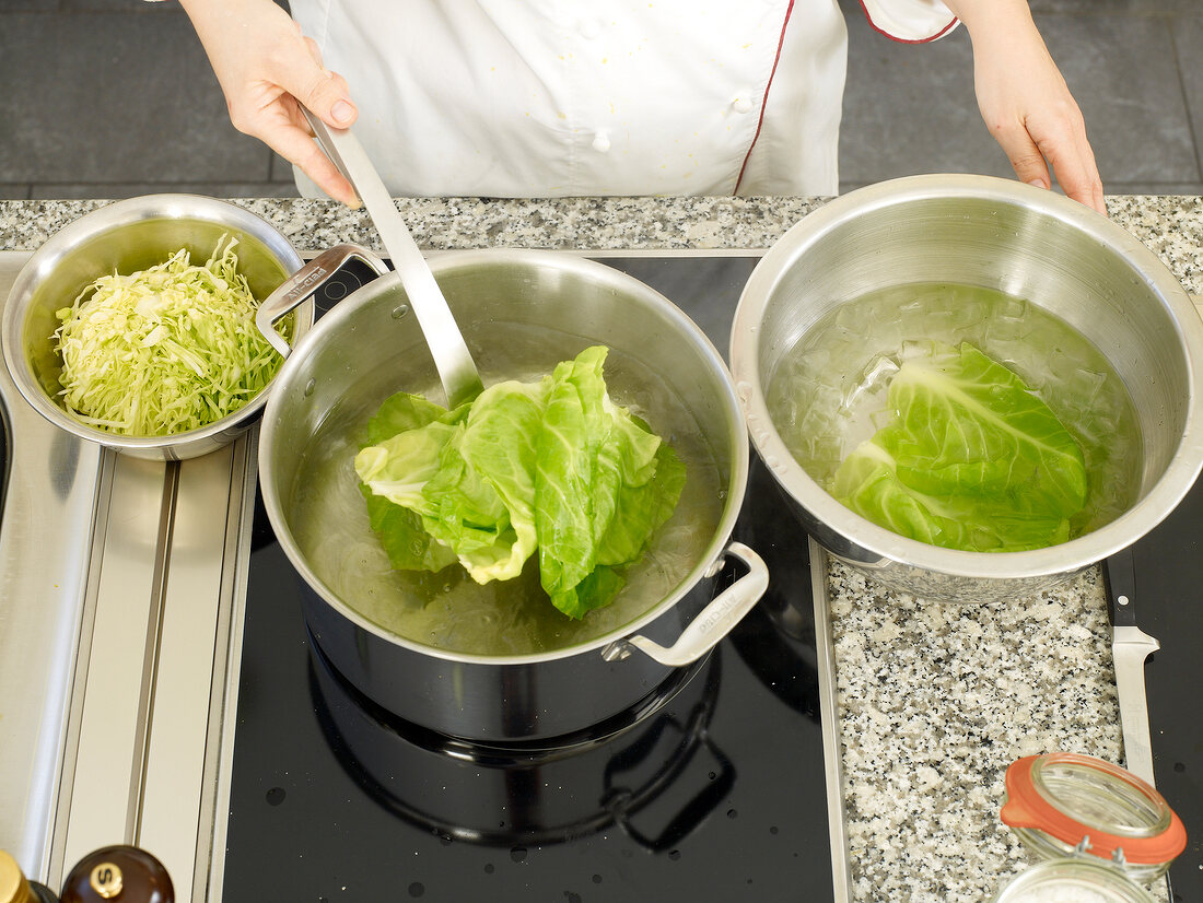 Cabbage leaves in hot and ice water