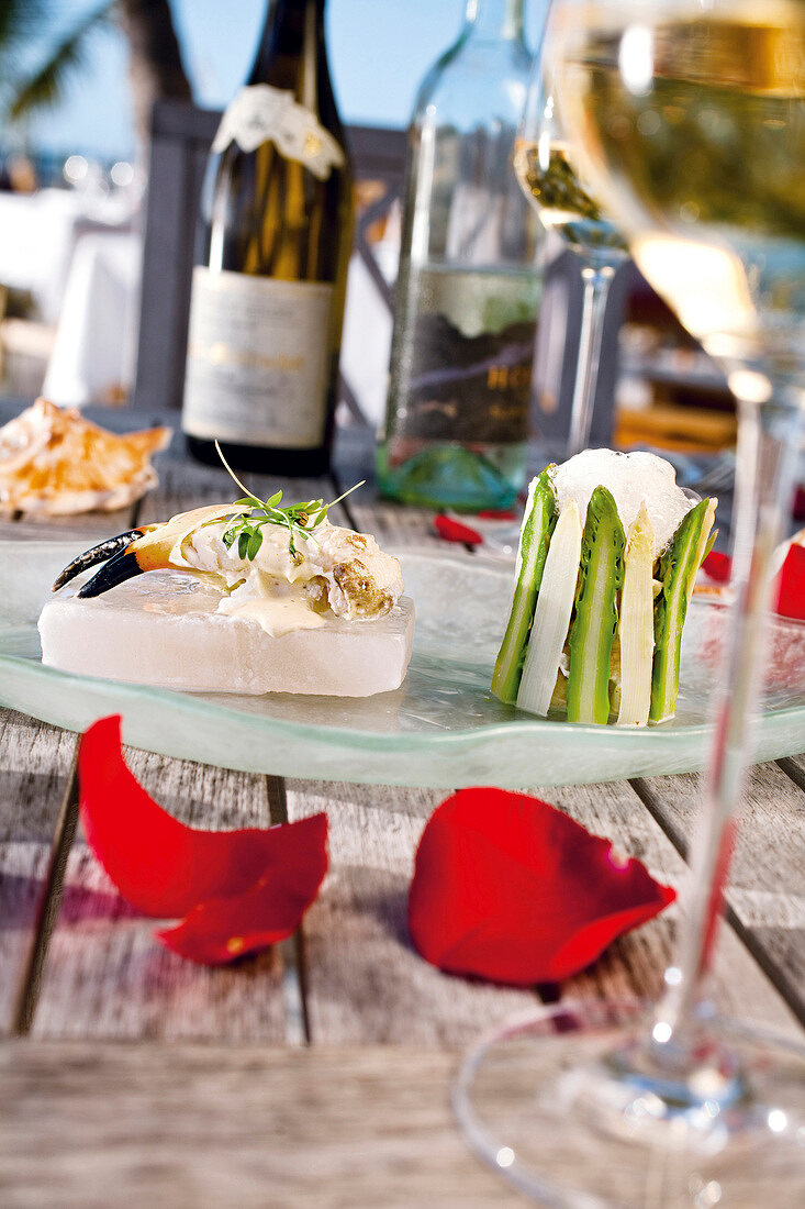 Lobster salad with asparagus, lemon and aioli foam on plate, Florida, USA