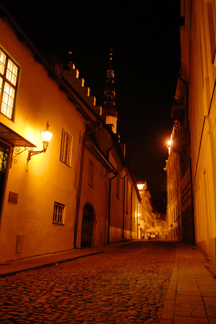 View of empty streets with street lights at night in Tallinn, Estonia, Russia