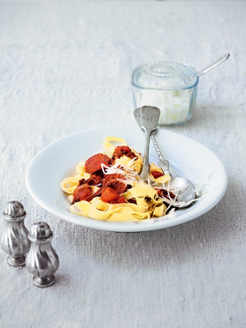 Tagliatelle arrabiata with pesto and Spanish garlic salami