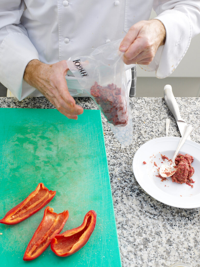 Putting minced beef in plastic bag