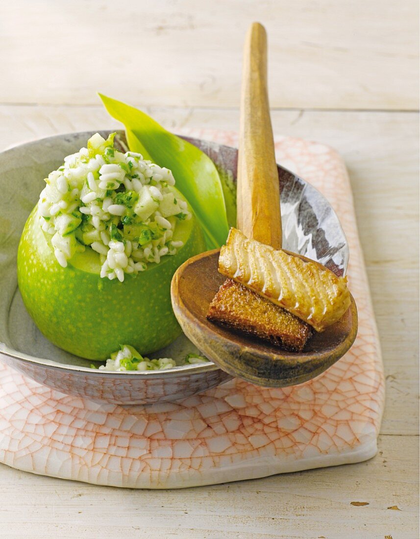 Wild garlic risotto served in a hollowed out Apple with smoked eel