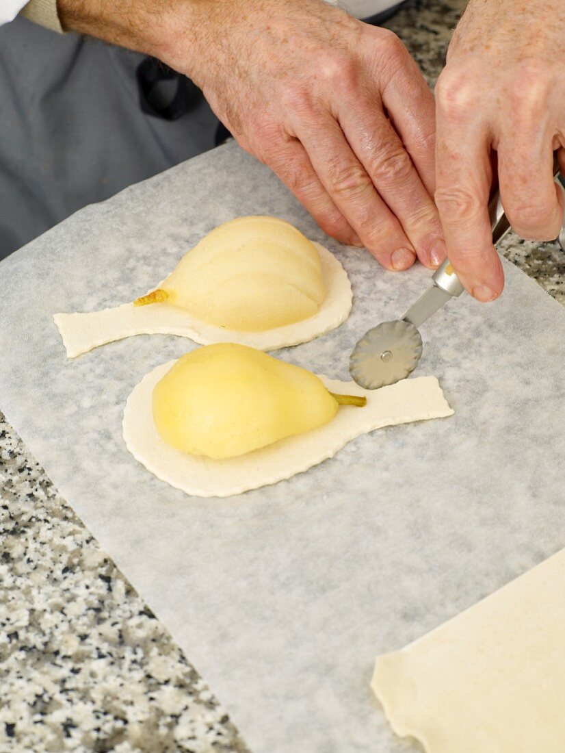 Pears in puff pastry being made