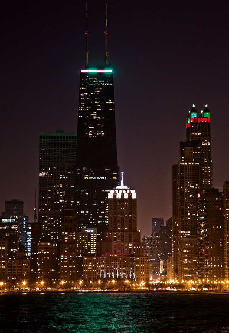 View of skyscrapers and skyline at night in Chicago, USA
