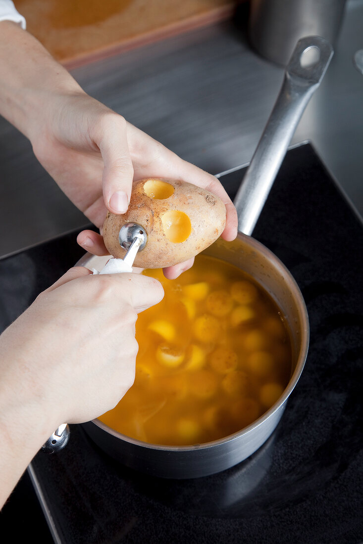 Close-up of potato being scooped from potato